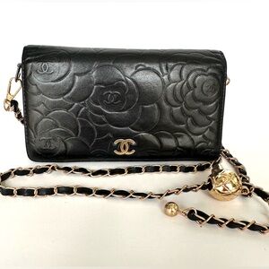 CHANEL Black Floral Embossed Wallet on Chain